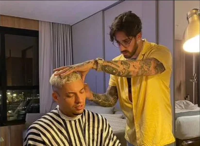 André Padilha atendendo Filipe Ret.
